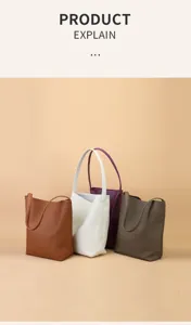 Minimalist genuine leather bucket bag for women, large capacity stylish commuter shoulder bag.