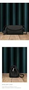 Black genuine leather soft cloud shoulder bag with cute elephant charm and smooth zipper closure