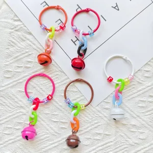 Colorful DIY keychain rings with letter beads and cute bells, fashion bag charms accessories.