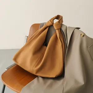 Brown soft leather knotted hobo bag stylish shoulder handbag for women daily commute main view