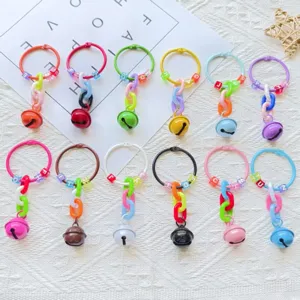 Colorful bell keychain DIY accessories cute key rings with letter beads and metal loops.