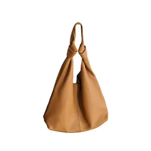 Stylish brown leather hobo bag with knotted handle for women commuting casual daily use