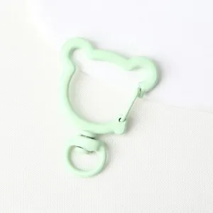 Mint green bear shaped metal spring snap hook for DIY jewelry keychains and accessories.