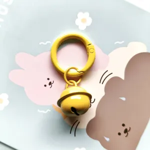 Yellow metal spring ring clasp with bell pendant, cute bag charm key ring accessory diy gift.