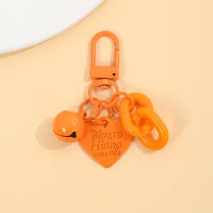 Porte-clés pendentif cœur cloche chaîne acrylique orange vif accessoire de sac élégant.
