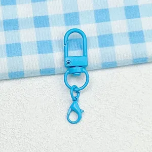 Blue metal swivel lobster clasp keychain hook detail, DIY craft bag pendant accessory.