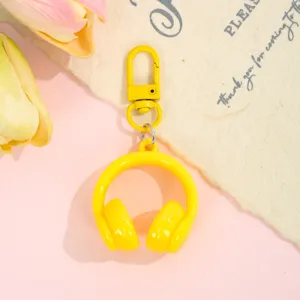 Candy color 3D headphone keychain, cute creative bag pendant and stylish accessory charm.
