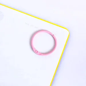 Metal binder ring detail shot, pink color 30mm open ring for DIY crafts and accessories.