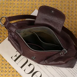 Vintage brown leather shoulder bag, casual underarm hobo tote with spacious interior.