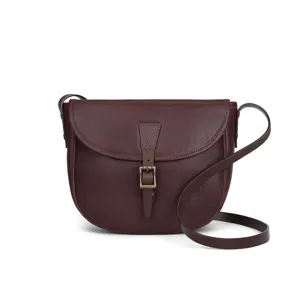 Vintage leather saddle bag for women, large capacity crossbody bag with adjustable strap.