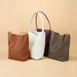 Classic leather bucket bag, large capacity minimalist shoulder tote bag for daily commute.
