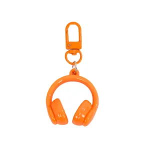 Orange 3D headphone keychain, candy color bag charm, stylish cute pendant accessories.