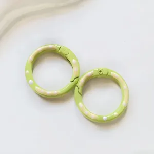 Metal spring ring clasp detail shot green donut design DIY jewelry keychain accessory