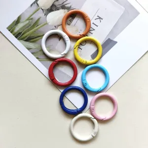 Colorful metal spring rings for keychains, bags, and DIY crafts, durable and stylish hardware.