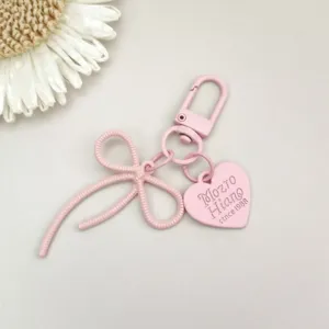 Rosa Legierung Schleife Schlüsselanhänger mit Herzanhänger, DIY Zubehör für Handytaschen.