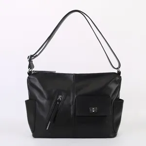 Black genuine leather shoulder bag for men and women, minimalist French style crossbody bag.
