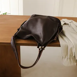 Genuine leather women's shoulder bag casual large capacity stylish slouchy backpack daily use.
