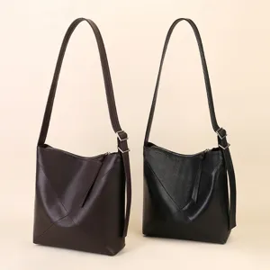 Stylish genuine leather bucket bag for women, large capacity crossbody shoulder tote bag.
