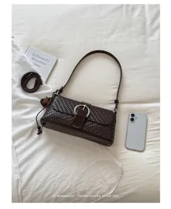 Retro woven shoulder bag for women, stylish vintage daily commuter crossbody bag with buckle.