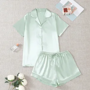Detailed view of women satin short sleeve pajama set in light green, smooth texture style.
