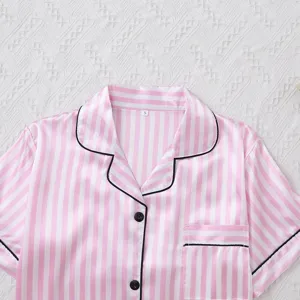 Pink striped satin pajama top detail, short sleeve sleepwear with collar and chest pocket.