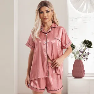 Pink striped satin short sleeve pajama set for women featuring elegant black piping trim.