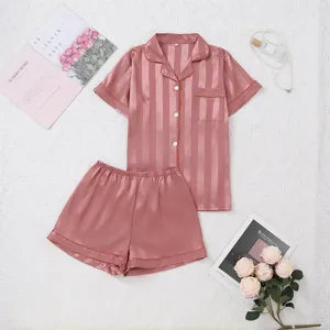 Women pink striped satin pajama set, short sleeve button-up top and comfortable shorts loungewear.