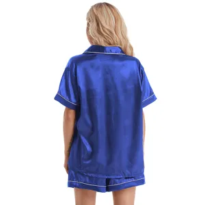 Back detail view of women's royal blue satin short sleeve pajama set with white piping.