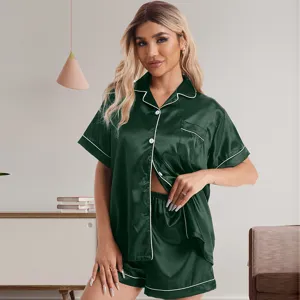 Dark green satin short-sleeve pajama set with white piping, comfortable loungewear detail view.