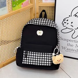 Sac à dos scolaire à carreaux japonais avec broderie de pomme et pendentif ours pour les étudiants.
