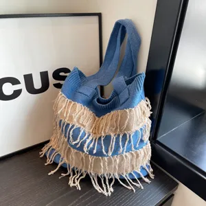 Blue knitted shoulder bag with beige fringe, casual large capacity beach tote for women.