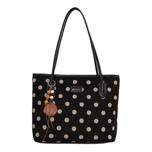 Stylish black polka dot tote bag, large capacity shoulder handbag for daily work commuting use.