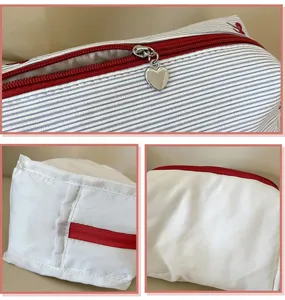 Süße Kosmetiktasche mit Schleifenstickerei und Streifendesign, große tragbare Make-up Reisetasche.