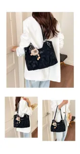Vintage black shoulder bag for women, large capacity autumn tote with cute bear pendant.