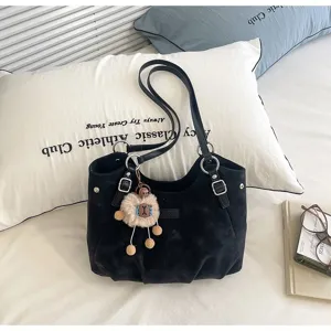 Black retro large capacity shoulder tote bag for women, casual commuter fashion handbag.