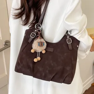 Retro brown tote bag for women, large capacity casual shoulder bag with cute plush keychain.