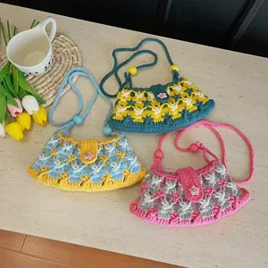 Handmade crochet crossbody bag for women, cute floral knit shoulder bag with beaded strap.