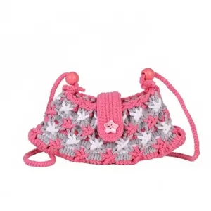 Cute pink and grey handmade crochet crossbody bag for women, stylish knit shoulder bag with cute button.