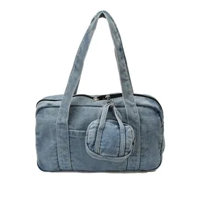 Vintage denim handbag for women, casual shoulder tote bag with mini coin purse accessory.
