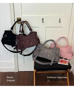 Trendy rivet underarm shoulder bag for women, stylish retro commuter crossbody bag.