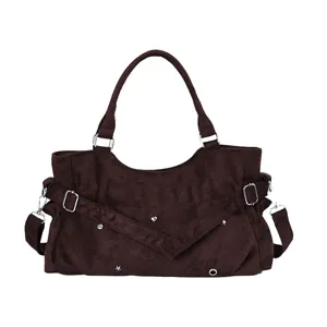 Vintage brown suede shoulder bag for women with stylish metal buckles and chic rivet charms.