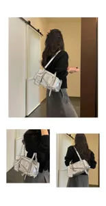 Stylish silver shoulder bag for women, large capacity metallic pillow bag for commute.