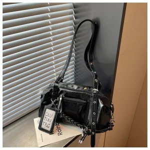Stylish black patent leather shoulder bag with multi-strap design, trendy commuter pillow bag for women.