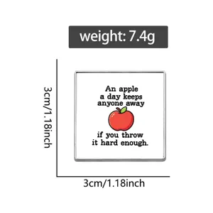 Close-up detail shot of the square metal brooch showing exact dimensions, weight, and text.