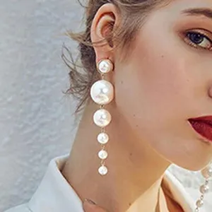 Elegant long pearl drop earrings featuring graduated multi-pearl design for women fashion.