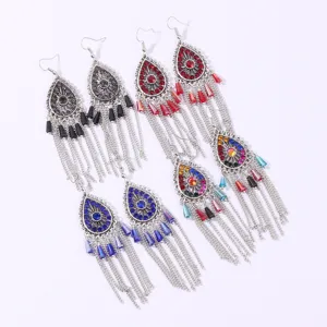 Close up of bohemian teardrop rhinestone tassel earrings ethnic style detail view