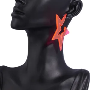 Neon pink acrylic star earrings detail showcase, perfect for summer party and vacation styles.