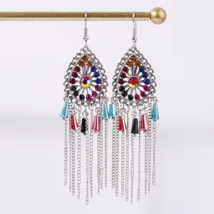 Detailed close-up view of bohemian teardrop rhinestone tassel earrings with colorful beads.