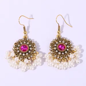 Bohemian vintage alloy gold drop earrings with pink rhinestones and white pearls for women.