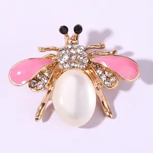 Rhinestone bee brooch, cute insect design with pink enamel wings and pearl body for suit pin.
